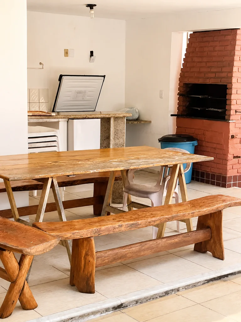 Area externa com churrasqueira da Casa Naira